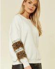 Leopard look faux fur embellished sleeves jumper