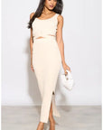 Knitted bodycon style vest top with tie up design and midi pencil skirt co-ords set in beige