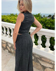Pointelle knit vest top and maxi pleated skirt in black