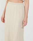 Pointelle knit vest top and maxi pleated skirt in beige