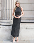 Pointelle knit vest top and maxi pleated skirt in black