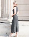 Pointelle knit vest top and maxi pleated skirt in black