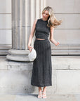 Pointelle knit vest top and maxi pleated skirt in black