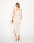 Knitted bodycon style vest top with tie up design and midi pencil skirt co-ords set in beige