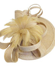 Fascinator With Feather & Sculptural Loop Detail In Beige