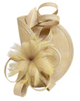 Fascinator With Feather & Sculptural Loop Detail In Beige