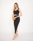 Knitted bodycon style vest top with tie up design and midi pencil skirt co-ords set in black