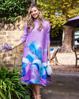 Multi Color Print Pleated Dress in three quarter sleeves in Purple floral print