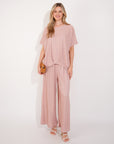 Oversized comfort stretch-jersey top and Relaxed-fit trousers in Pink