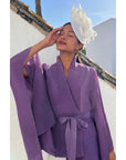 Fascinator With Feather & Sculptural Loop Detail In White