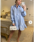 Blue color Oversized shirt dress in pop pattern fabric in ruffle hem design