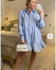 Blue color Oversized shirt dress in pop pattern fabric in ruffle hem design