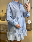 Blue color Oversized shirt dress in pop pattern fabric in ruffle hem design