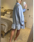 Blue color Oversized shirt dress in pop pattern fabric in ruffle hem design