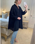 Oversized shirt dress in black with shimmy hues fabric design