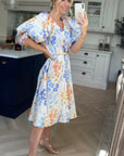 Oversized puff sleeve midi dress in Multi color floral print