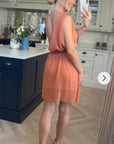 Sleeveless Mini Wrap Dress in coral color