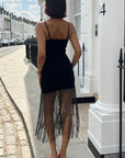 Long fringed tassel detail hem bodycon knit dress in black