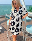 Floral print cotton blend linen holiday dress in black