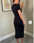 Soft cotton knit dress with collared and buttons down design in Black