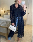 Oversized long shirt dress with floral embellished design in black