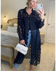 Oversized long shirt dress with floral embellished design in black