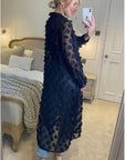 Oversized long shirt dress with floral embellished design in black