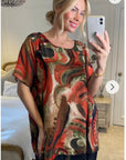 Oversized Short Sleeve Tunic In Orange And Black Abstract Print