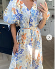 Oversized puff sleeve midi dress in Multi color floral print