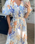 Oversized puff sleeve midi dress in Multi color floral print
