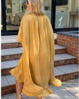 Ruffle Hem Oversized dress with belt in yellow