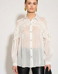 Pleated ruffles with multi dimoned stone embellished sleeves design organza shirt in white