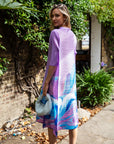 Multi Color Print Pleated Dress in three quarter sleeves in Purple floral print