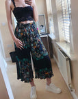 Palm tree and animal scarft print pleated trousers