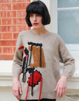 Un-finished tassel fringed knitted jumper