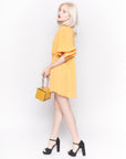 Top with Oversized Ruffle Sleeves in Mustard Yellow