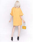 Top with Oversized Ruffle Sleeves in Mustard Yellow