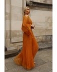 Pleated long dress with organza pleated cape sleeves in Gold