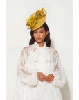 Fascinator With Feather & Sculptural Loop Detail In Gold