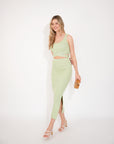 Knitted bodycon style vest top with tie up design and midi pencil skirt co-ords set in green