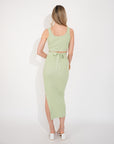 Knitted bodycon style vest top with tie up design and midi pencil skirt co-ords set in green