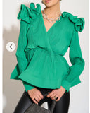 Pleated shirt with ruffle hem and floral design on shoulder in green