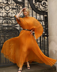 Pleated long dress with organza pleated cape sleeves in Gold