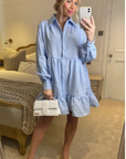 Blue color Oversized shirt dress in pop pattern fabric in ruffle hem design
