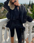 Silky satin feeling Cape sleeves design short dress in Black