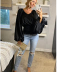 Puff sleeve smocked top in black
