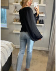 Puff sleeve smocked top in black