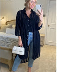 Oversized shirt dress in black with chiffon ruffle stripe design