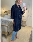 Oversized shirt dress in black with chiffon ruffle stripe design