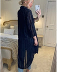 Oversized shirt dress in black with chiffon ruffle stripe design